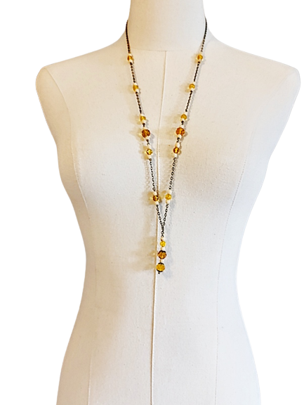 1930s_vintage_long_topaz_glass_bone_bead_necklace-removebg-preview (1).png