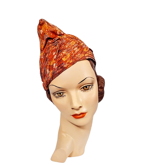 1930s_vintage_peaked_pixie_fabric_orange_turban_hat-removebg-preview.png