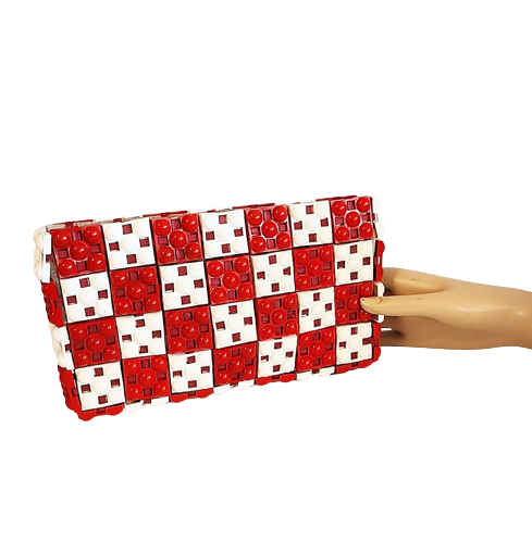 1940s_red_and_white_vintage_plastic_tile_clutch_bag-removebg-preview.png