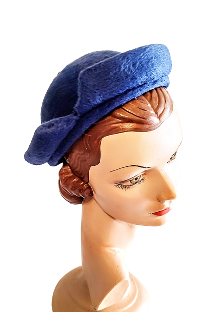 1950s_vintage_blue_small_hat_with_turned_up_brim_pieces__tassel-removebg-preview.png