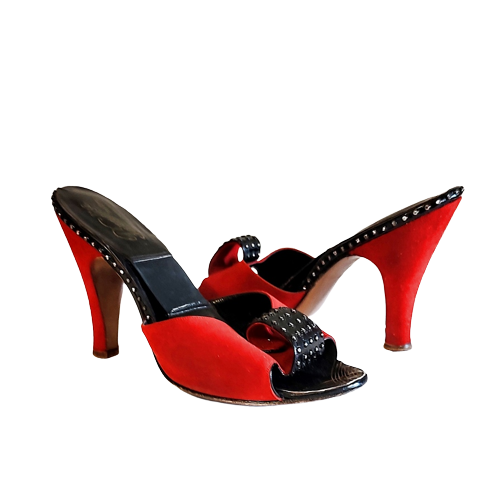 1950s_vintage_red_suede_springolator_slides_shoes_black_trim_studs-removebg-preview.png