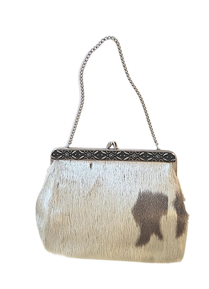 1970s_fancy_design_victorian_look_cow_fur_skin_tan_handbag_vintage-removebg-preview.png