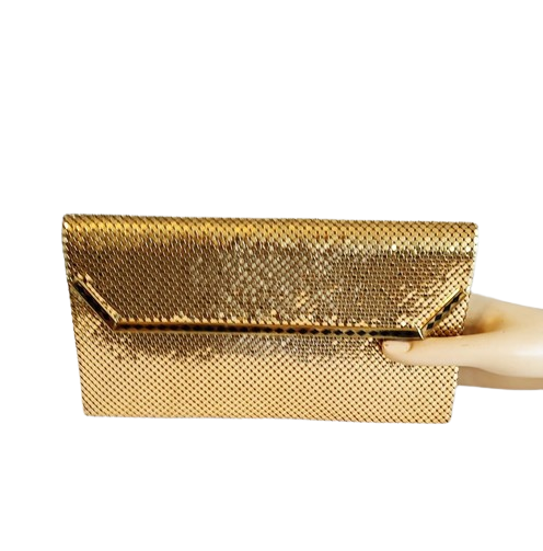 1980s_gold_mesh_long_clutch_bag_whiting_and_davis-removebg-preview.png