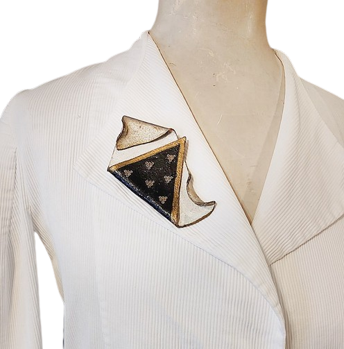 1990s_vintage_leather_pin_white_black_gold_artisan_made_diamond_free_form-removebg-preview.png