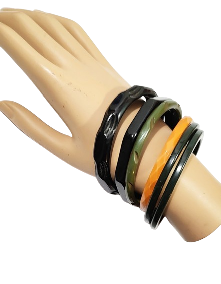 6_1940s_vintage_bakelite_bangles_bracelets_spacers_asstd_colors-removebg-preview.png