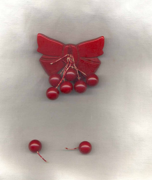 Bakelite Cherries Bow Brooch Broken Front.jpg