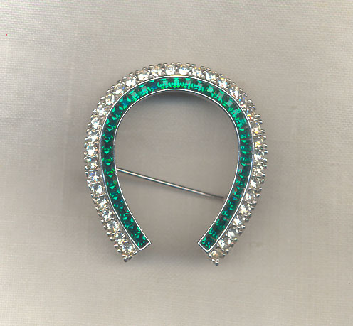 Ciner Emerald and Clear Rhinestone Horseshoe Pin.jpg