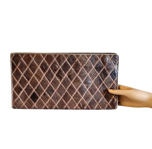 large_brown_1940s_vintage_snakeskin_handbag_clutch_purse-removebg-preview.png