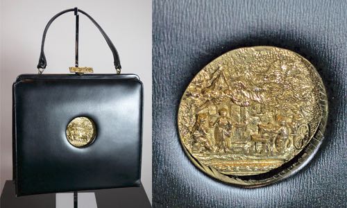 P342-1960s black leather handbag larger size gold metal inset.jpg