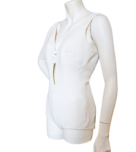side-white_vintage_one_piece_swimsuit_1960s_70s_unworn_plunging_front_removebg-preview.png 3.png