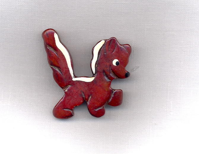 Skunk Wood and Paint Brooch.jpg