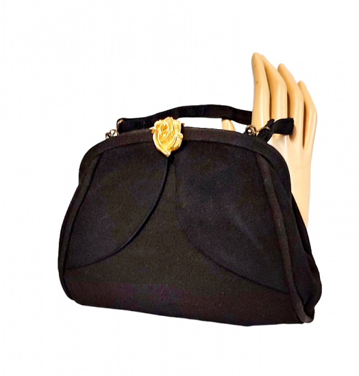 vintage 50 60s black evening bag gold flower clasp.png